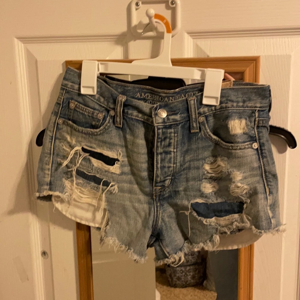 American Eagle vintage denim ripped shorts size 4 with multiple buttons